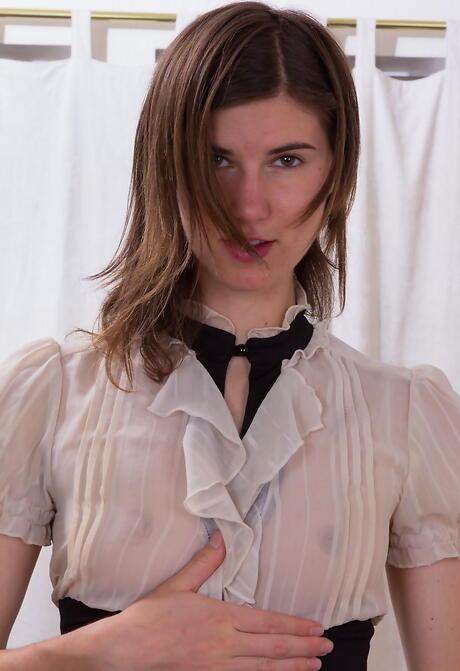 Sultry dark-haired Kiyoko revealing tiny tits and puting a toy in her pussy in office