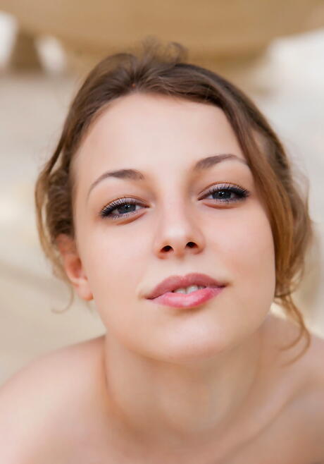 Stunning young Nikia A baring tiny tits and hot ass outside