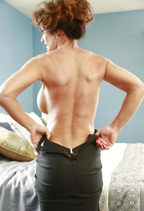 Curious german redhead older Deauxma baring big knockers and hot ass 